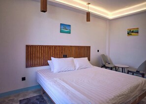 Habitación doble Deluxe, 1 habitación | Ropa de cama de alta calidad y minibar 