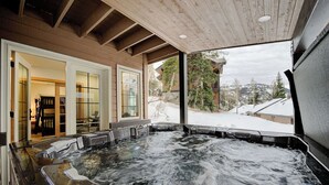 A hot tub area with multiple tubs, a wooden ceiling, and a view of a snowy landscape through large windows. - The Baldy Traverse Retreat ski-in/out to Snowbird complimentary shuttle to Alta (Snowbird)