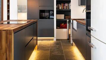 Fridge, microwave, stovetop, coffee/tea maker