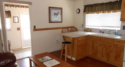 The Pinecone Cabin is a small cozy cabin in the heart of West Yellowstone, MT.