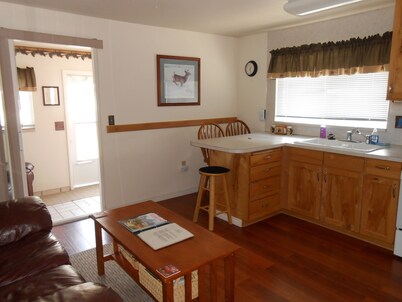 The Pinecone Cabin is a small cozy cabin in the heart of West Yellowstone, MT.