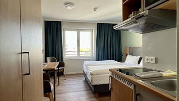 Chambre Confort | Bureau, espace de travail pour ordinateur portable