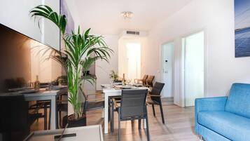 Deluxe Apartment, 2 Bedrooms, Garden View, Ground Floor | Living area | LCD TV