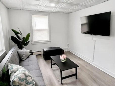 Smart TV, books. Bright 2BR by Boston Waterfront