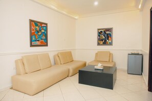 Two Bedroom Suite | Living area | 42-inch Smart TV with satellite channels