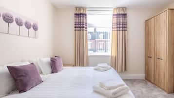 Premium bedding, down comforters, desk, soundproofing