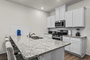 Fridge, microwave, oven, stovetop - Single-Level Crew Stay | 3BR Near Aubrey Projects (Krugerville)