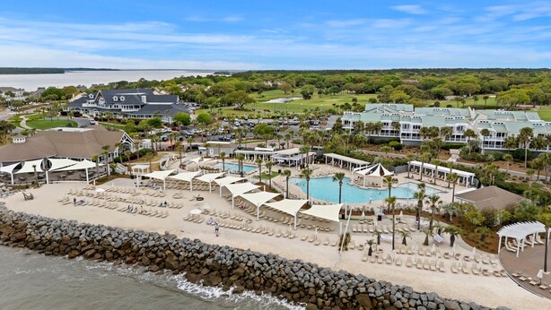 A resort with a pool, beach, and golf course. - 5 BR Seabrook Oasis on Ocean Winds Course- Private Pool, Club Access! (Seabrook Island)