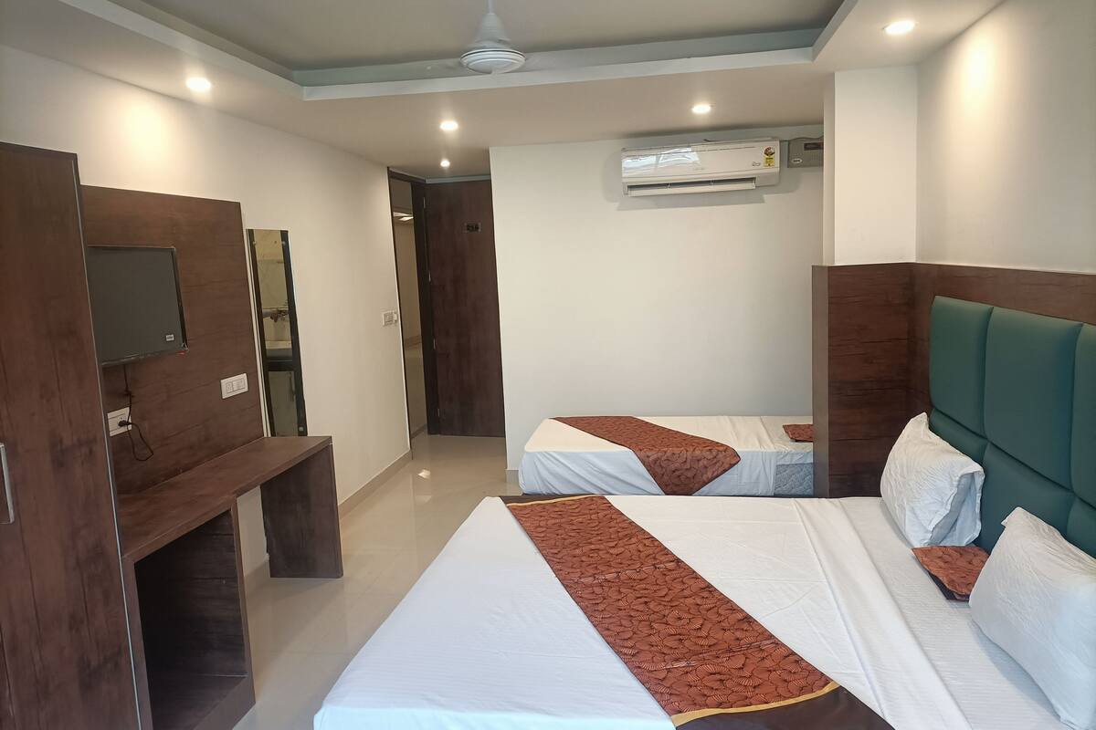 deluxe double room | living area | 42-inch led tv with cable channels, fireplace, netflix