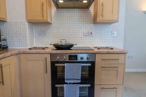 Apartment | Private kitchen | Fridge, microwave, oven, stovetop