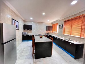 Apartment, Multiple Beds | Private kitchen | Fridge, microwave, oven, stovetop - Charming 5-bed Penthouse in Victoria Island, Lagos (Lagos)