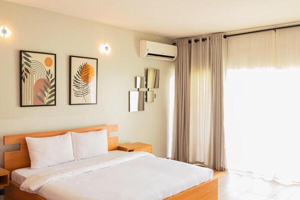 Appartement, 2 grands lits | 2 chambres, fer et planche à repasser, Wi-Fi gratuit, draps fournis