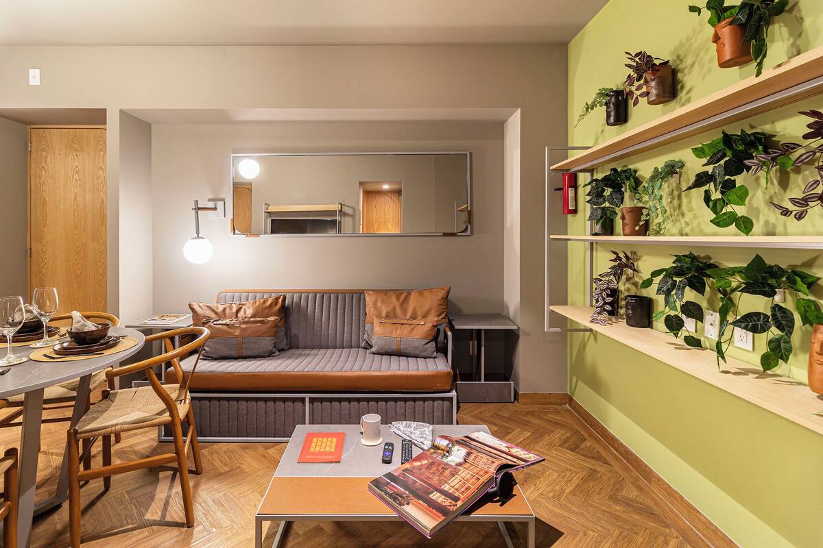 Deluxe Apartment, 1 Bedroom, Terrace (Studio) | Living area | 50-inch Smart TV with cable channels