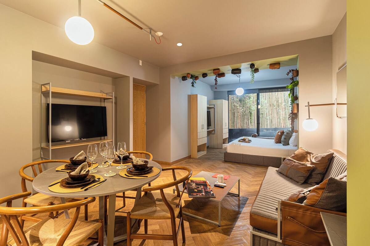 Apartment, 1 Bedroom, Terrace | Living area | 50-inch Smart TV with cable channels
