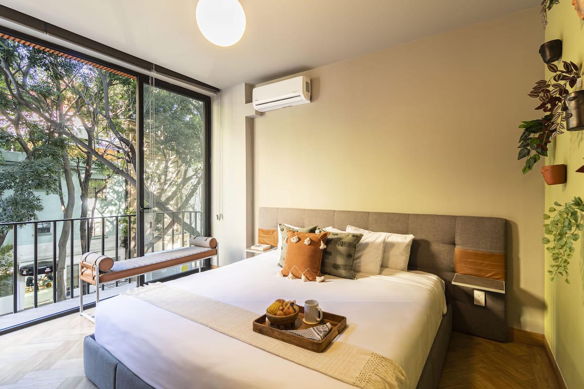 Apartment, 1 Bedroom, Balcony, City View | 1 bedroom, hypo-allergenic bedding, down duvets, in-room safe