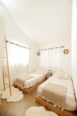 3 bedrooms, desk, iron/ironing board, travel cot