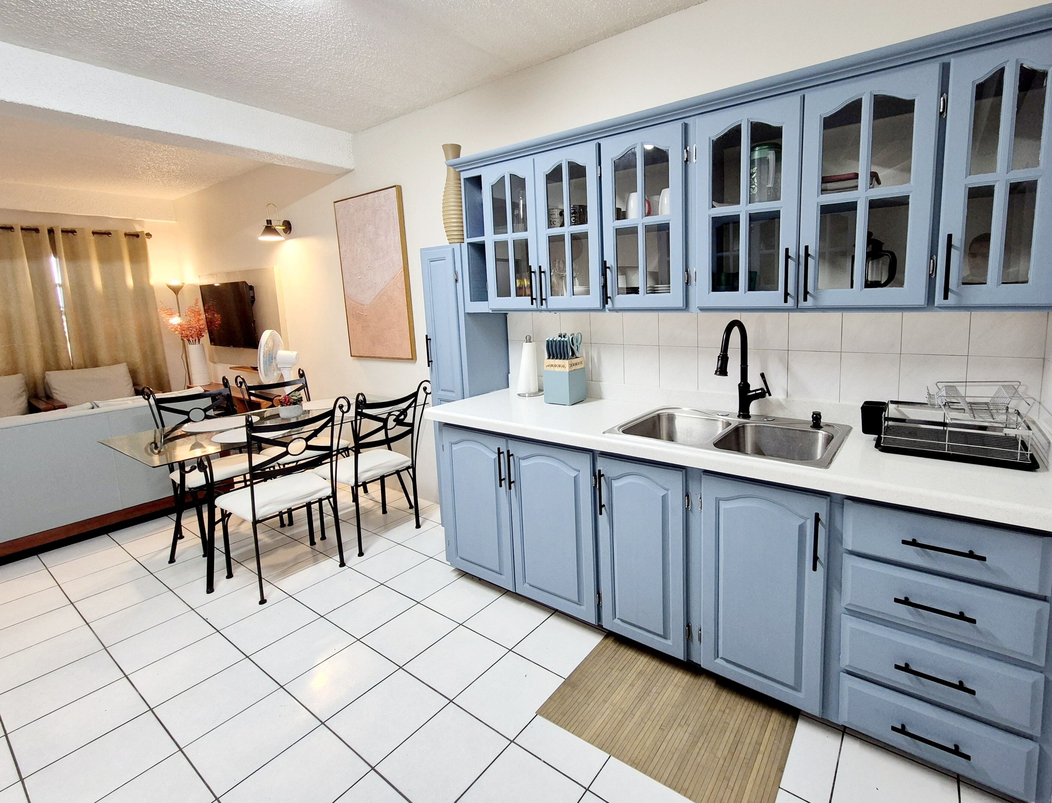 Deluxe Apartment, 2 Bedrooms | Private kitchen | Full-size fridge, microwave, oven, toaster