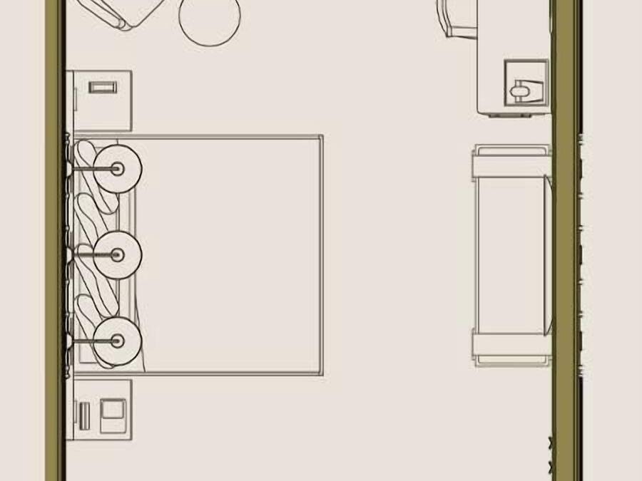 Een plattegrond van een hotelkamer met een badkamer, een kitchenette en een zithoek.