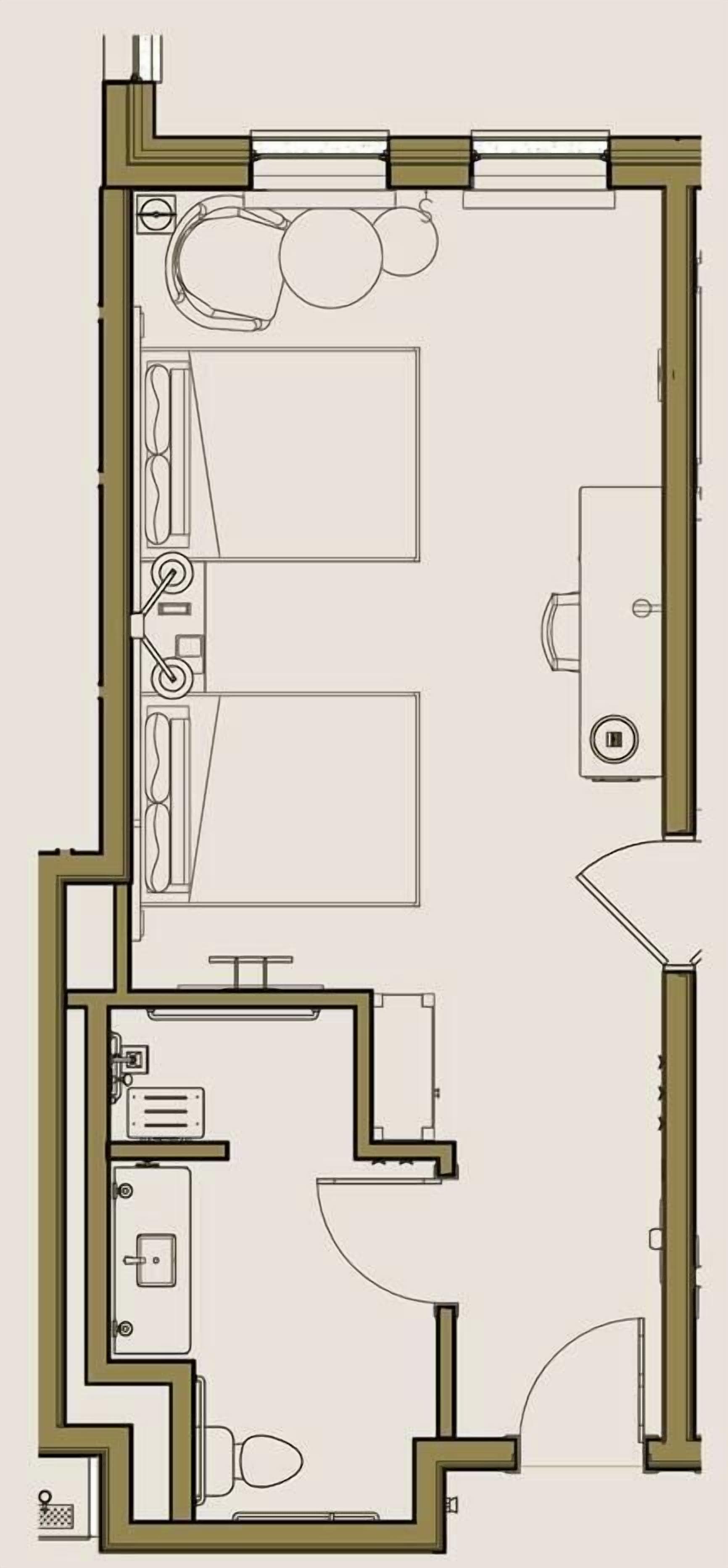 Plano de una habitación de hotel con baño, kitchenette y zona de estar.