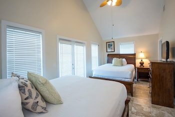 Premium bedding, in-room safe, laptop workspace, blackout drapes at Villas At Hawks Cay Resort