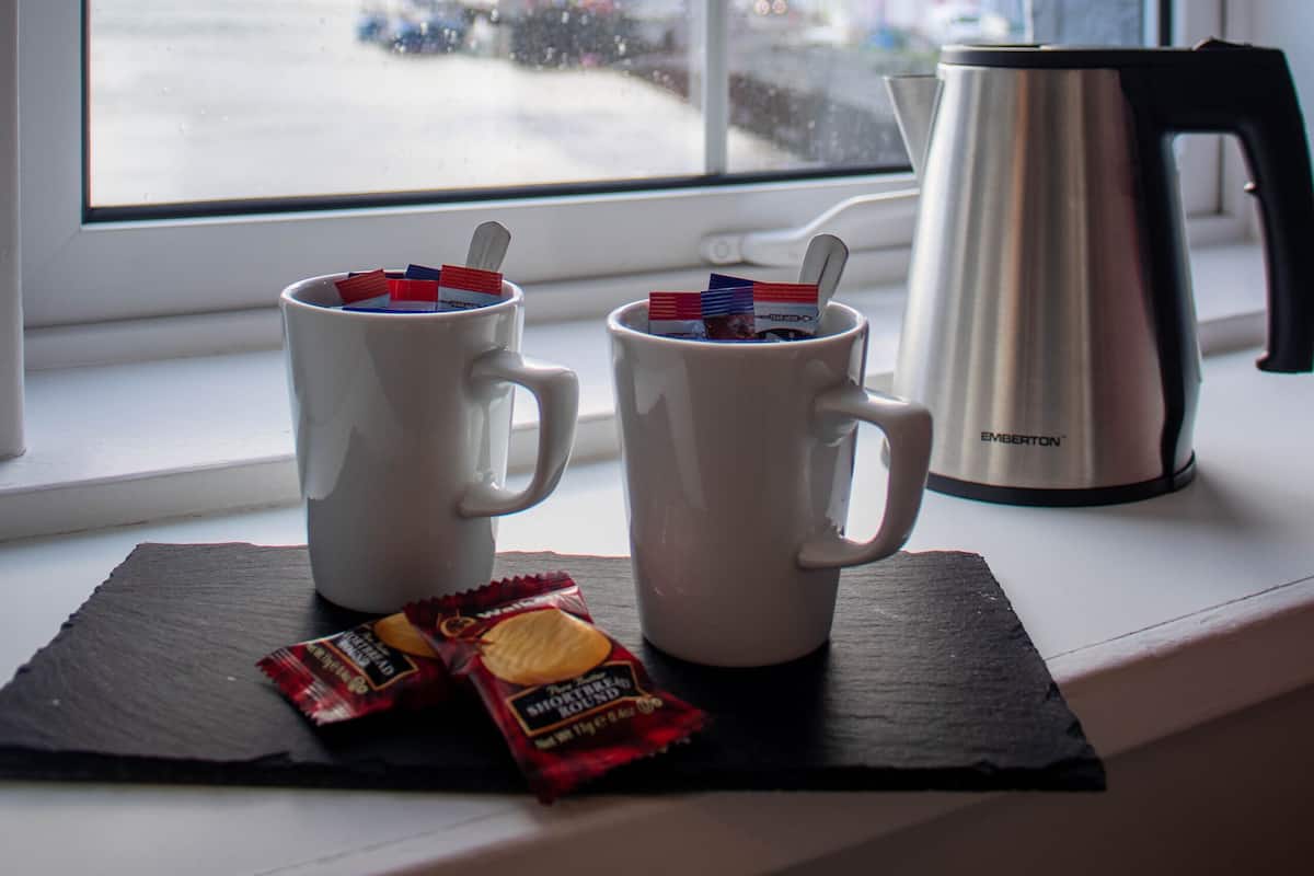 Deluxe vierpersoonskamer | Een strijkplank/strijkijzer, gratis wifi, beddengoed