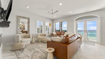 Condo, 3 Bedrooms, Ocean View, Beachfront (Rosey's Retreat) | Living area | 60-inch Smart TV with digital channels, fireplace, Netflix