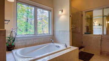 Jetted tub, hair dryer, towels, soap