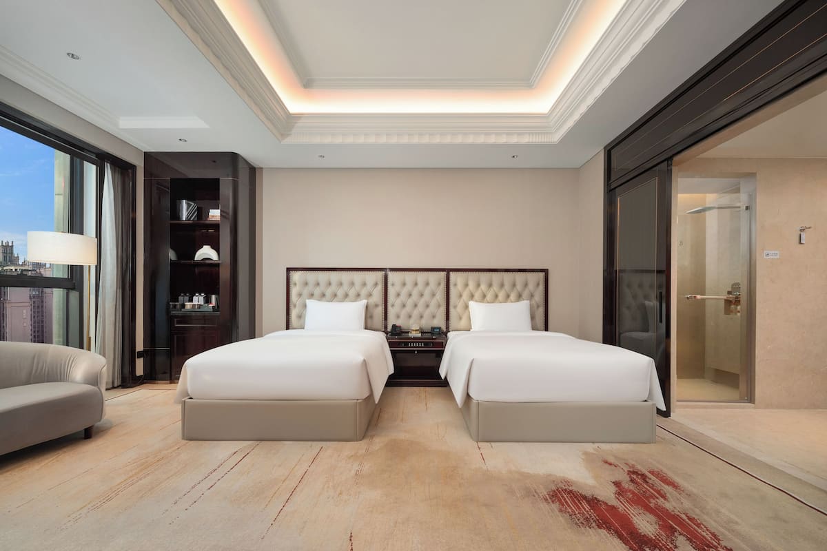 Premium bedding, down comforters, pillowtop beds, in-room safe