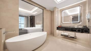 Separate bathtub and shower, rainfall showerhead, designer toiletries