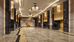 A luxurious hallway with marble floors, gold accents, and modern chandeliers. - Crowne Plaza Chengdu Tianfu New Area by IHG (Chengdu)