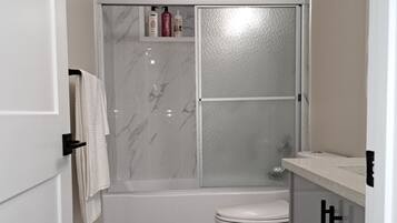 Hair dryer, towels, soap, shampoo