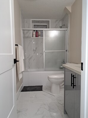 Hair dryer, towels, soap, shampoo