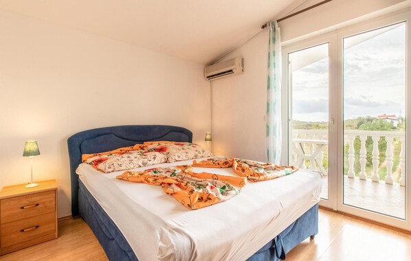1 chambre, accès au Wi-Fi (inclus), literie fournie