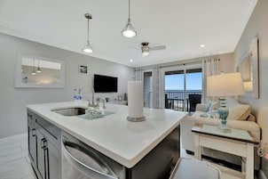 Design Condo | Private kitchen | Full-size fridge, microwave, oven, stovetop