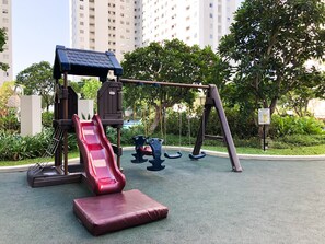 Children's play area - outdoor - Vibrant 2Br Apartment At Educity Surabaya (Surabaya)