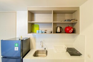 Apartment | Private kitchen | Full-size fridge, stovetop