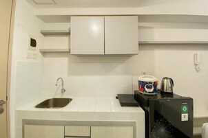 Estudio | Cocina privada | Frigorífico grande y placa de cocina