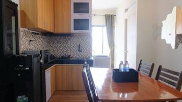 Departamento | Cocina privada | Refrigerador con congelador y parrilla de estufa