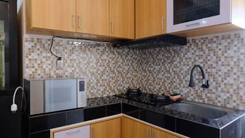 Departamento | Cocina privada | Refrigerador con congelador y parrilla de estufa