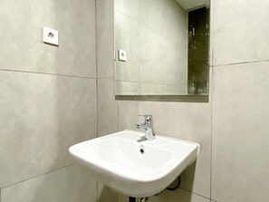 Studio | Bathroom - Homey And Cozy Stay Studio Room Pollux Chadstone Apartment (Cikarang)
