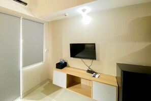 Studio | Free WiFi - Homey and Well Furnished Studio LRT City Jatibening Apartment (Bekasi)