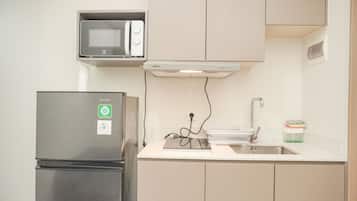 Apartamento | Cozinha privada | Geladeira grande, cooktop