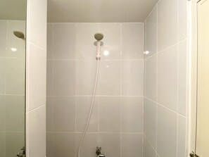 Studio | Bathroom | Shower, free toiletries, towels - New Furnished And Cozy Studio Tokyo Riverside Pik 2 Apartment (Teluknaga)