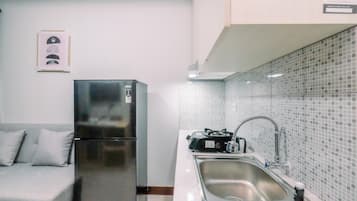Departamento | Cocina privada | Refrigerador con congelador y parrilla de estufa