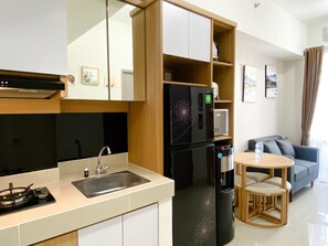 Apartment | Private kitchen - Comfort Living 1Br At Vasanta Innopark Apartment (Cikarang)