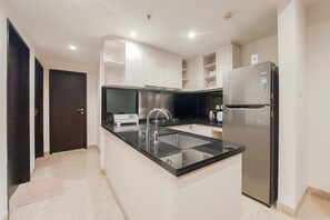 Apartment | Private kitchen - Modern Look And Spacious 2Br The Branz Bsd Apartment (Pagedangan)