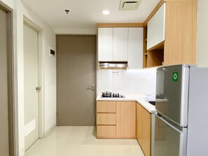 Apartment | Private kitchen | Full-size fridge, stovetop