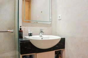 Departamento | Baño | Regadera y toallas 