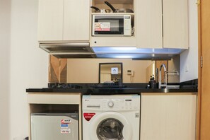 Departamento | Cocina privada | Refrigerador con congelador y parrilla de estufa 