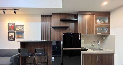 Warm And Cozy 2Br Vida View Makassar Apartment